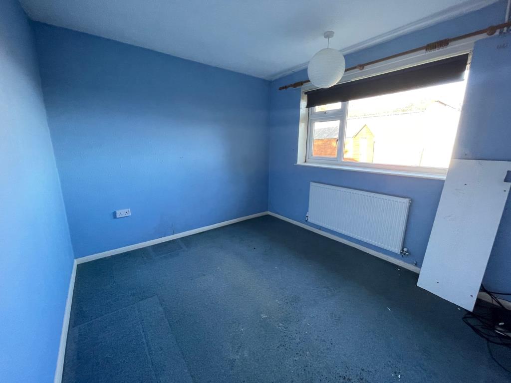 Lot: 76 - A DETACHED BUNGALOW FOR IMPROVEMENT AND REPAIR - Bedroom 2 with window to the side